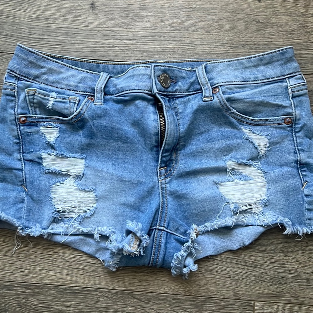 American Eagle light denim wash shorts. They are AE’s Shortie style.